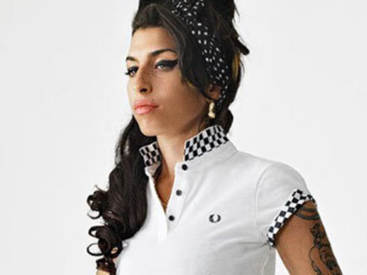 Эми Уайнхаус в одежде Fred Perry. Фото с сайта The Daily Telegraph