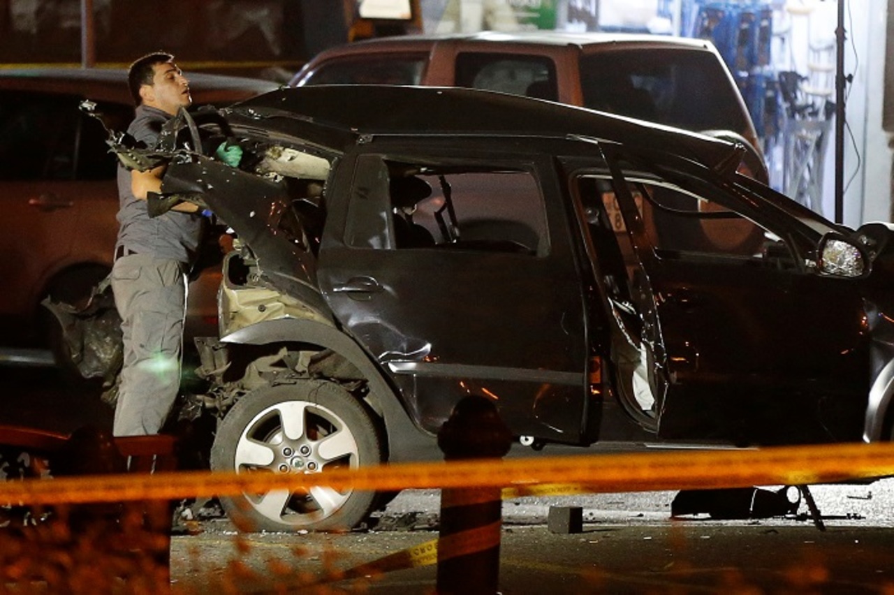 Автомобиль грузинского политика Гиви Таргамадзе после покушения. Фото: Reuters
