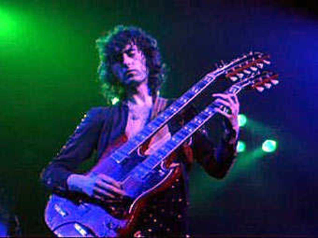 Джимми Пейдж с Gibson SG Double Neck. Кадр из фильма "The song remains the same"