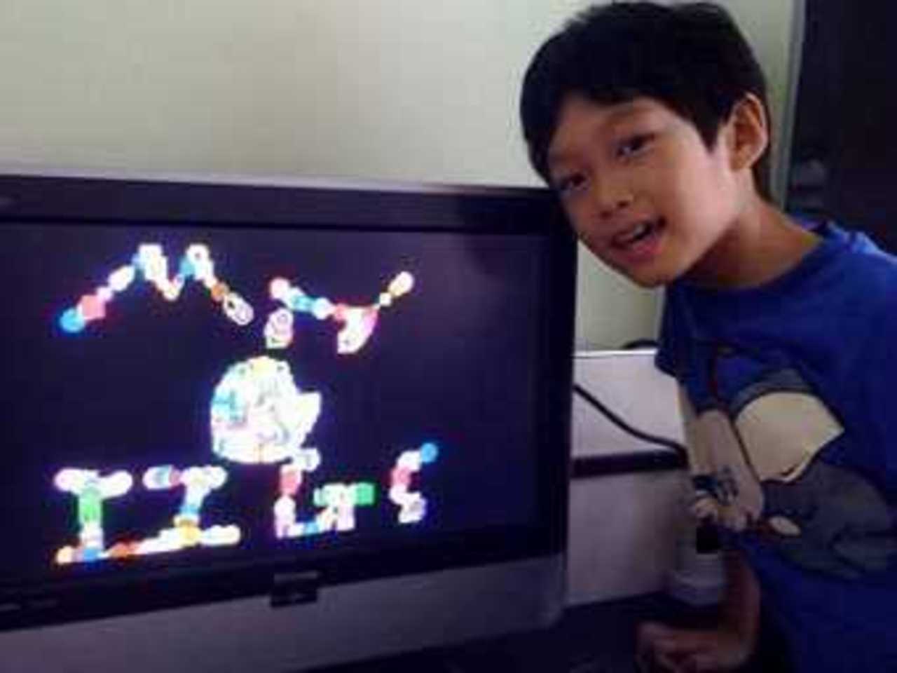Лим Дин Вэнь (на экране - приложение "Doodle Kids"). Фото с сайта larwe.com